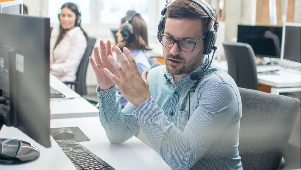 Lutron 24/7 customer support specialist providing technical guidance via headset