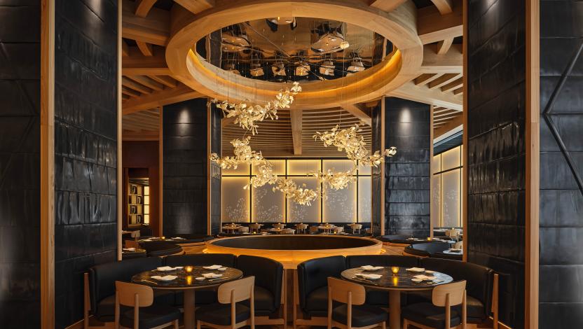 A Canada hospitality dining & social space with Lutron Sivoia and roller shades. © Joel Esposito