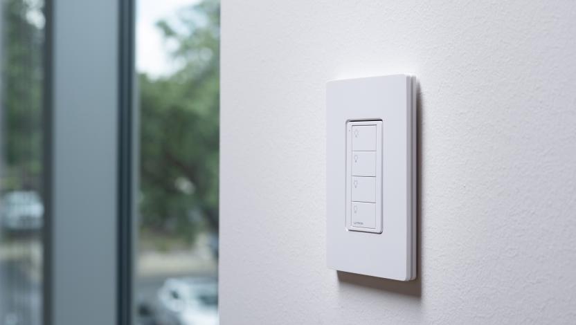Keypad with four-button control for simplified room management.