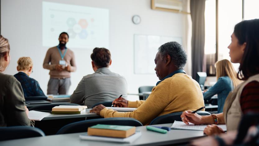 a group of people attending a training session