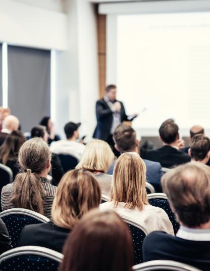 A group of professionals attend a training