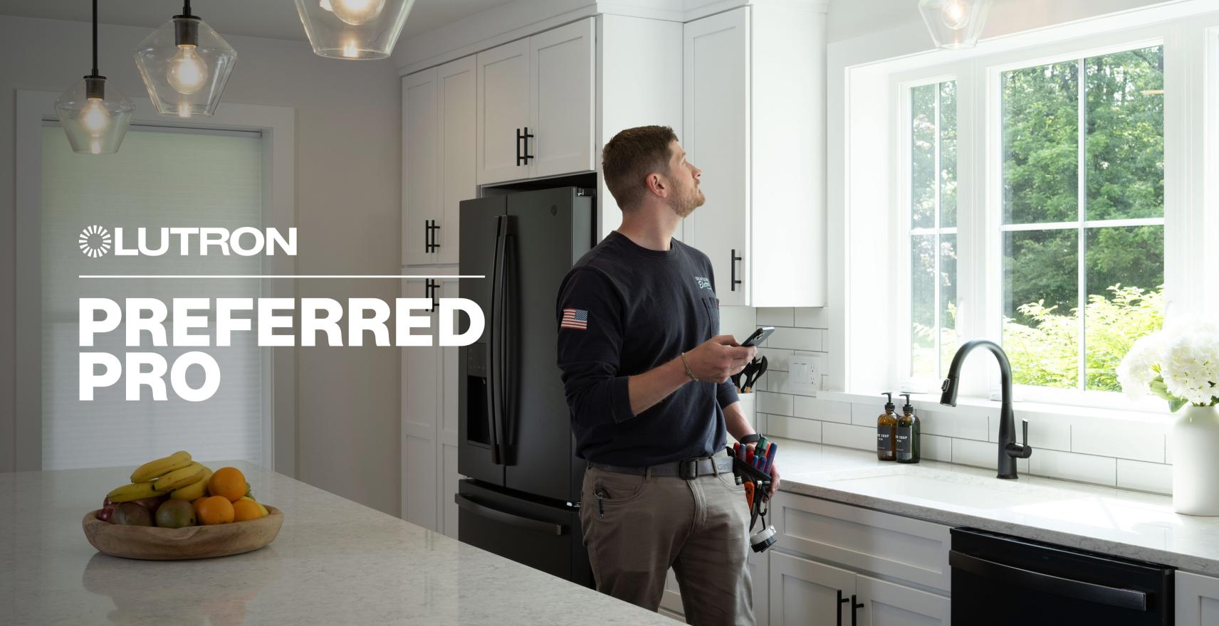 A Preferred Pro uses his phone to control the lights in his client’s kitchen.