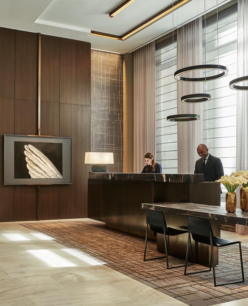  Hotel lobby with responsive lighting that syncs to time of day, supporting ambiance and operations across shared spaces 