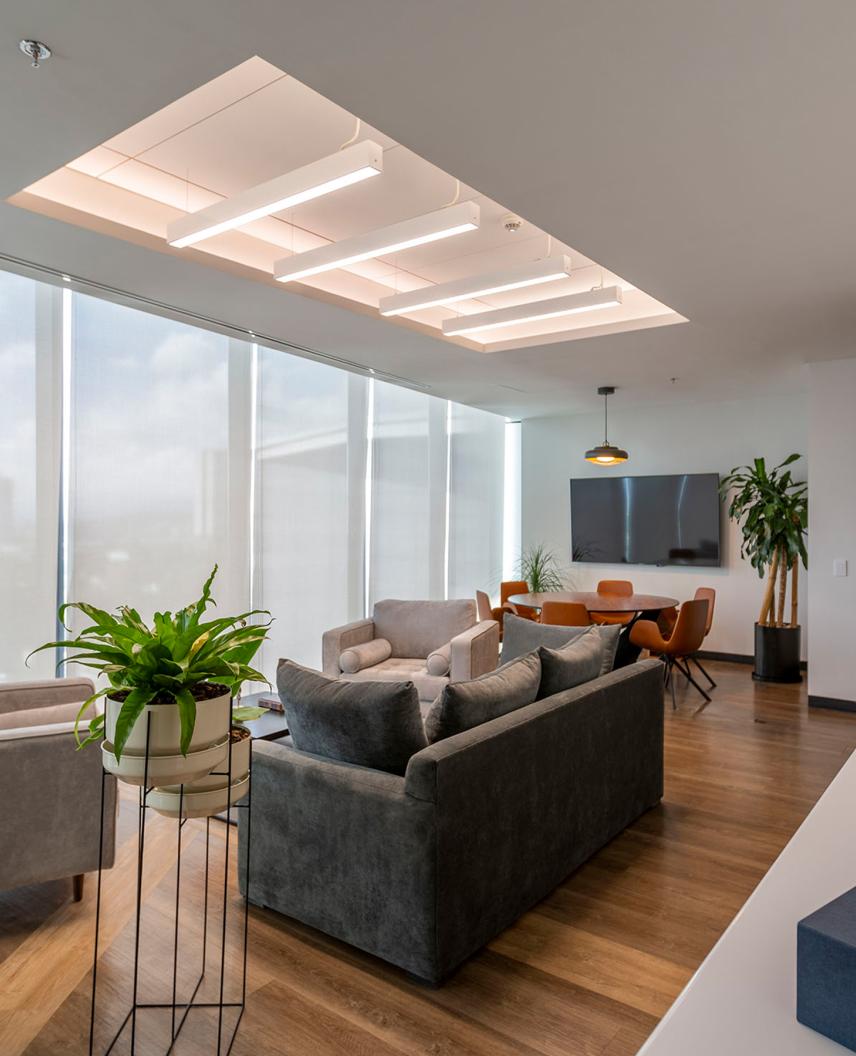Vive-enabled wireless fixtures embedded into an office ceiling.
