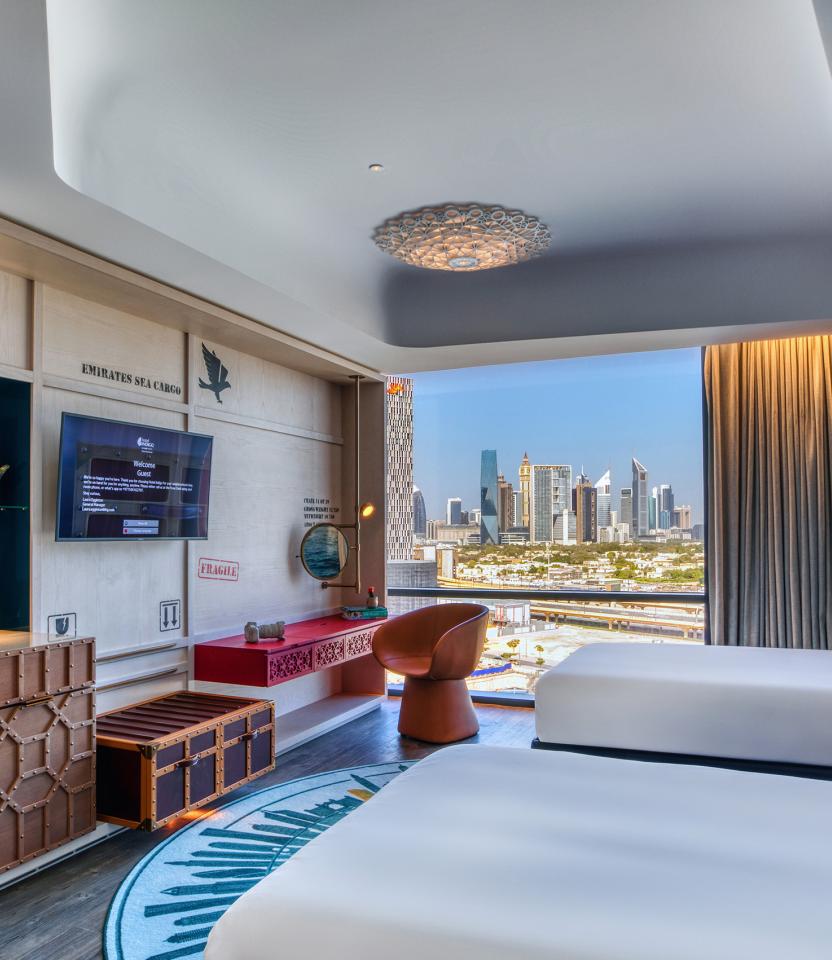 A Dubai hospitality Guest Room with Lutron drapery & myRoom XC.