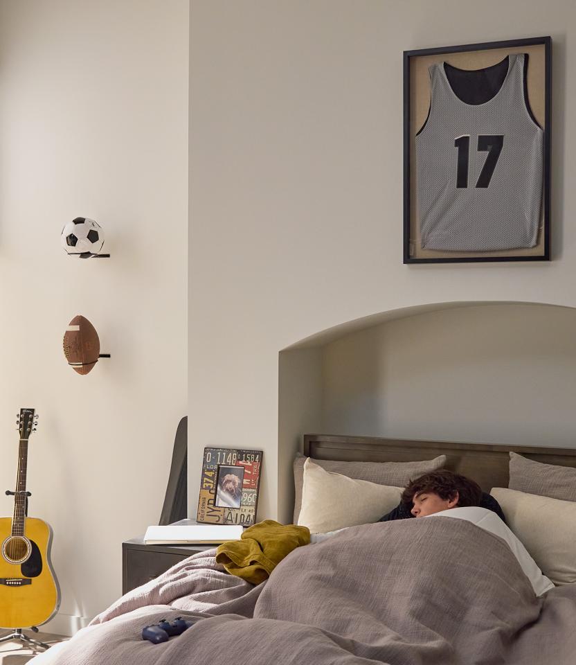 A Northeast private residence bedroom with Lutron Caséta& Honeycomb Shades