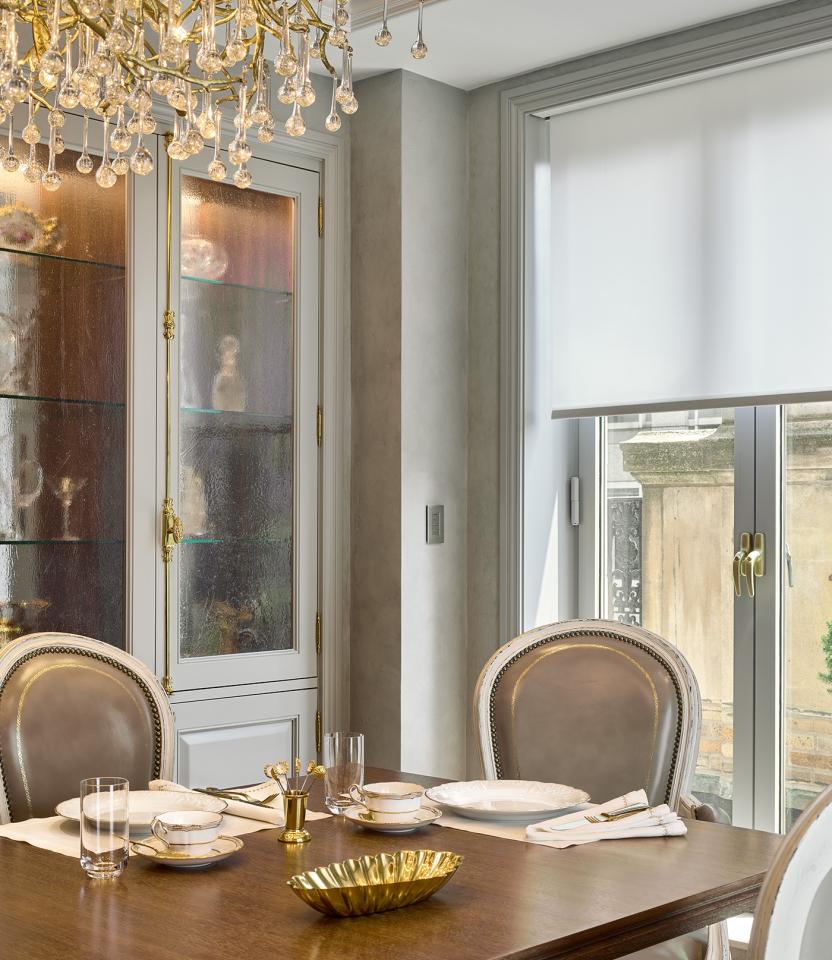A New York City residential dining room with LutronPalladiom, Sivoia and HomeWorks