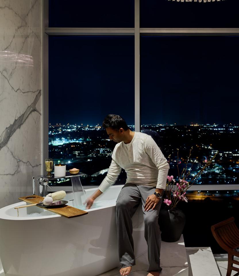 An Austin residential bathroom with Lutron Ketra lights, Palladiom, HomeWorks, Keypads & Remotes