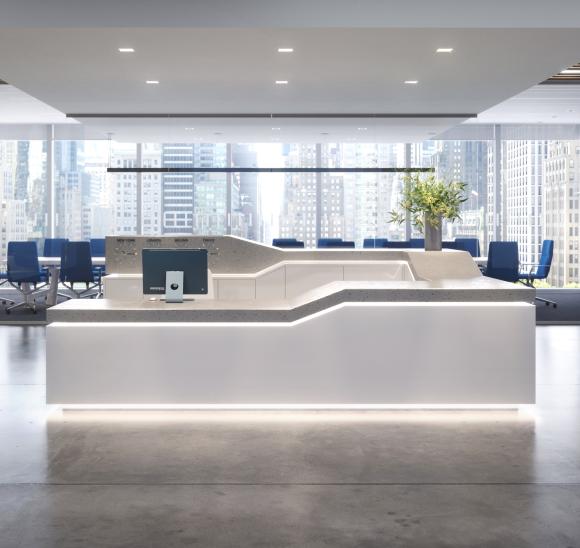 Modernist lobby with full-spectrum lighting and city views.