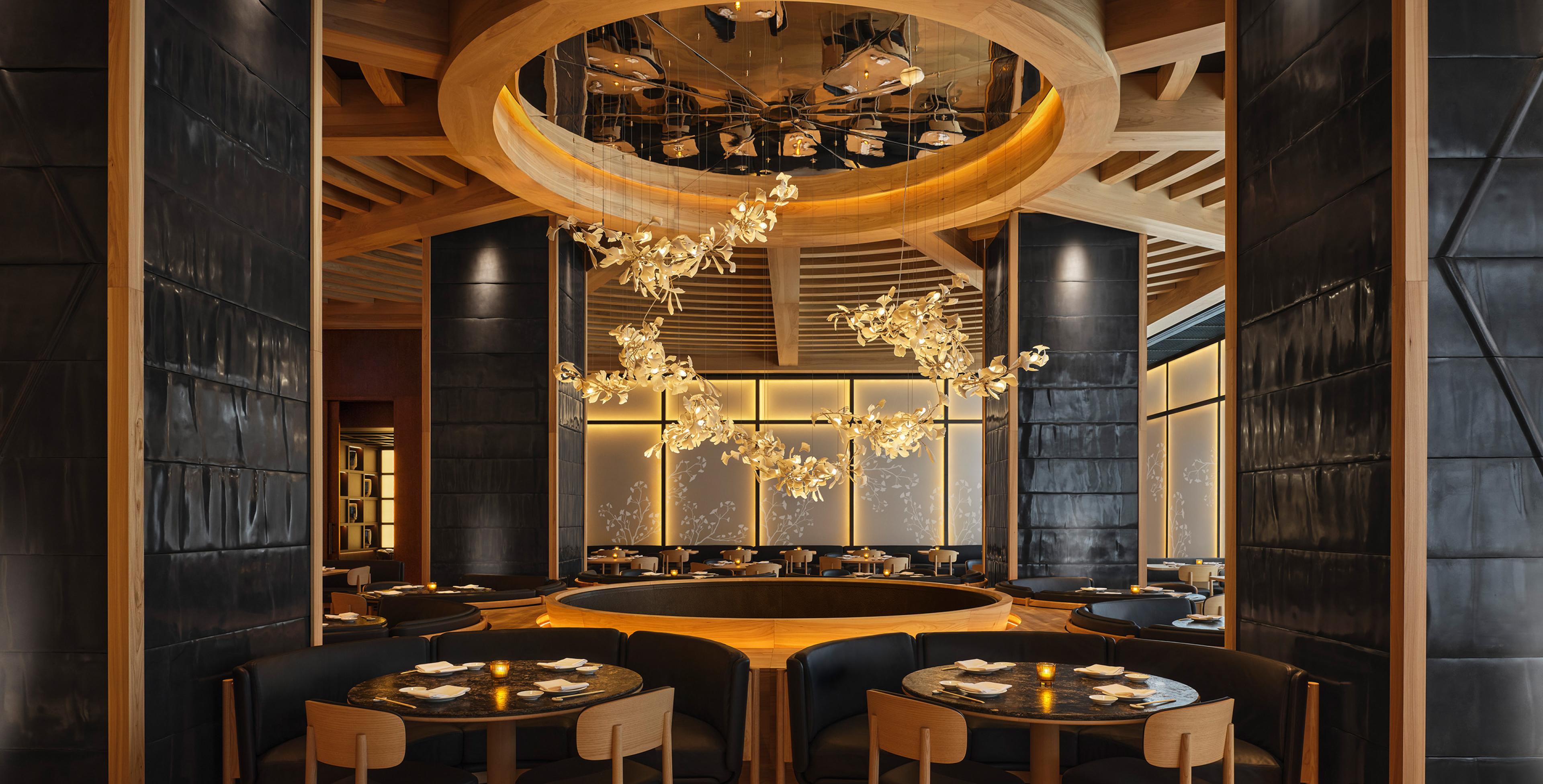 A Canada hospitality dining & social space with Lutron Sivoia and roller shades. © Joel Esposito