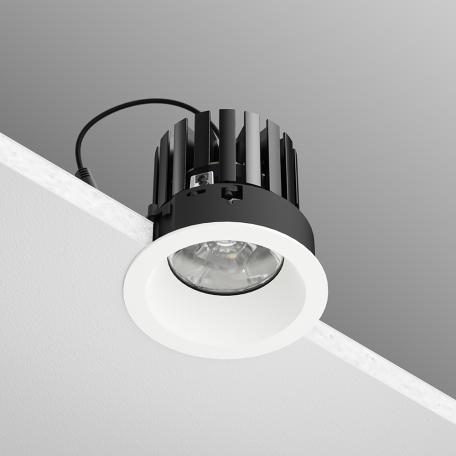 Close-up image of the Ketra D2 Downlight, featuring the white trim and black components.