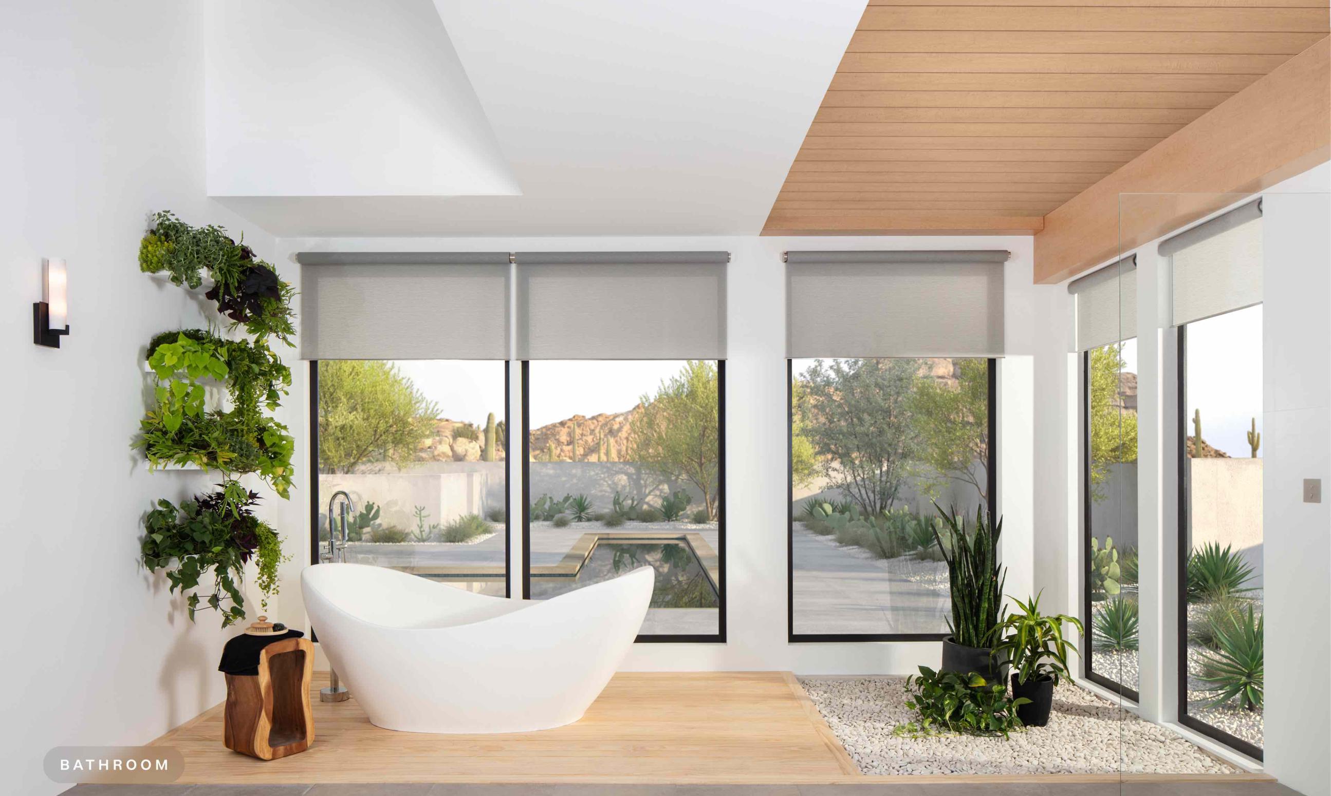 Bathroom with automated shades that filter sunlight and create a calm, comfortable environment for daily routines.