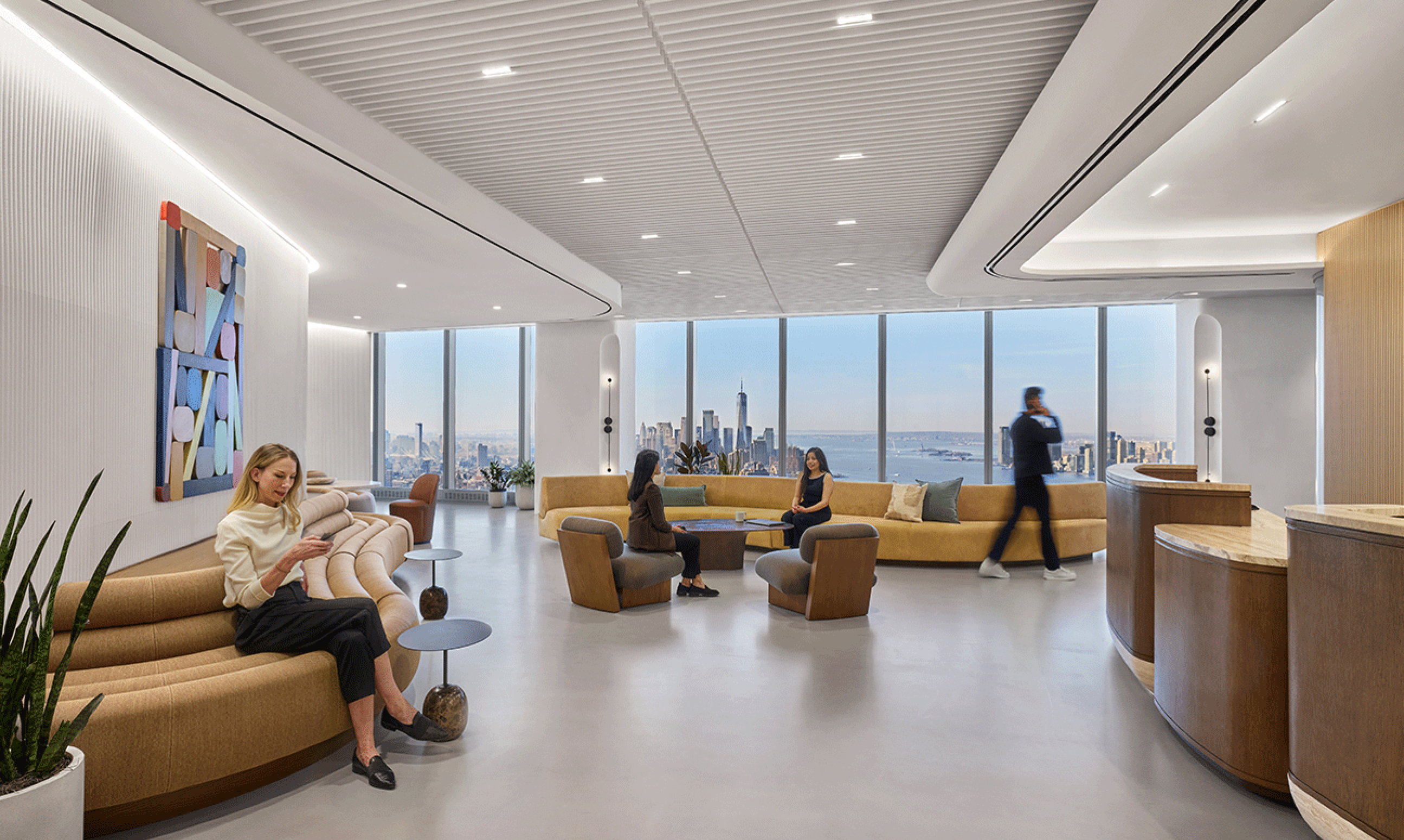 Employees in the entryway of a modern office building